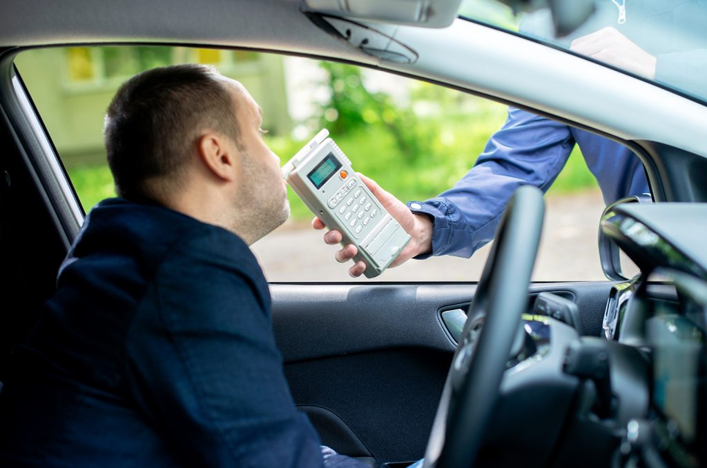 Driver due to being subject to test for alcohol content with use of breathalyzer