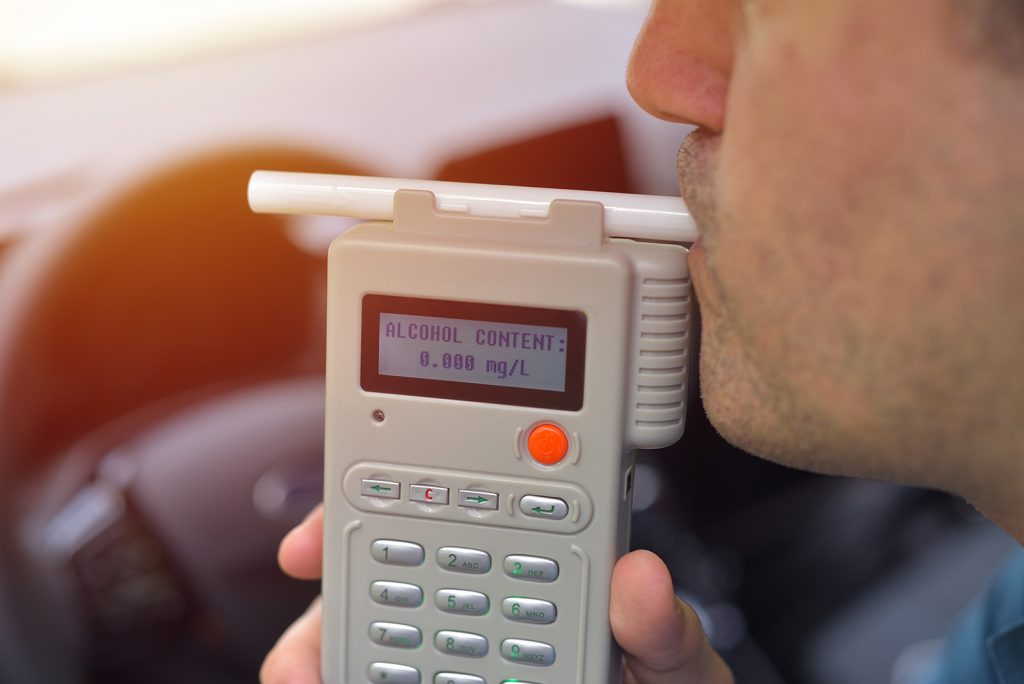 Driver due to being subject to test for alcohol content with use of breathalyzer